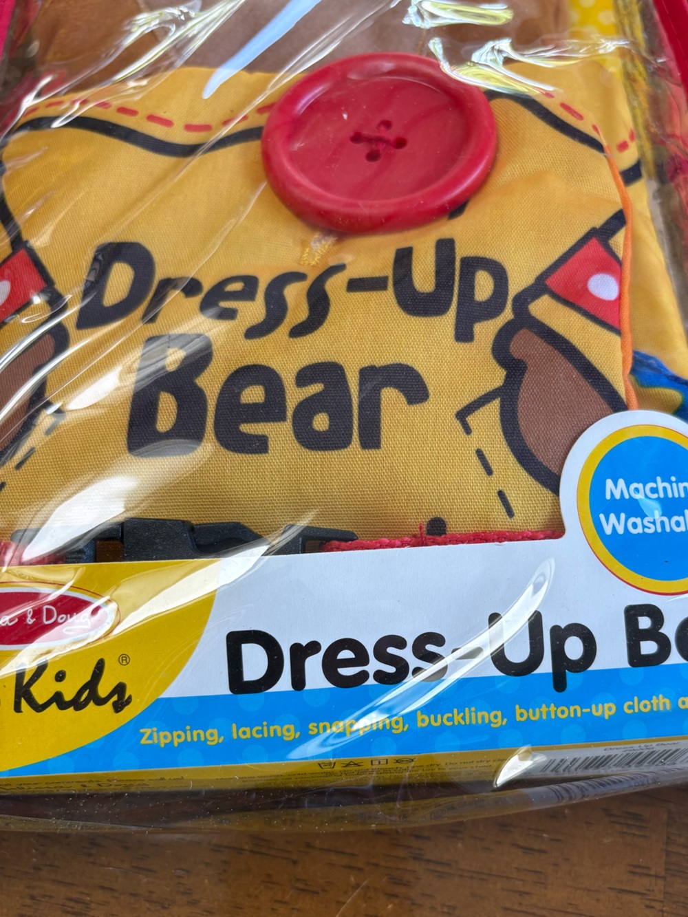 Melissa & Doug Dress-Up Bear Book Yellow with Red Accent